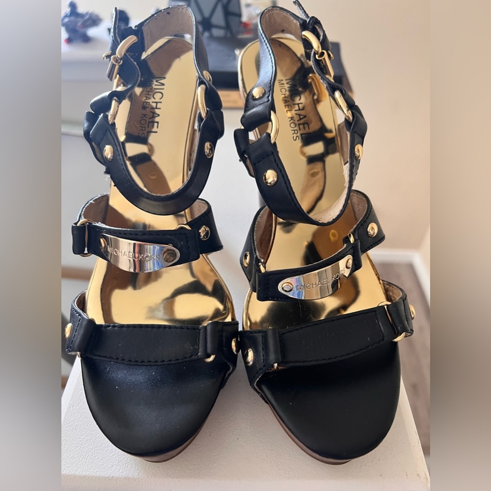 Michael Kors: embellished gold blocked heel open toe strap.